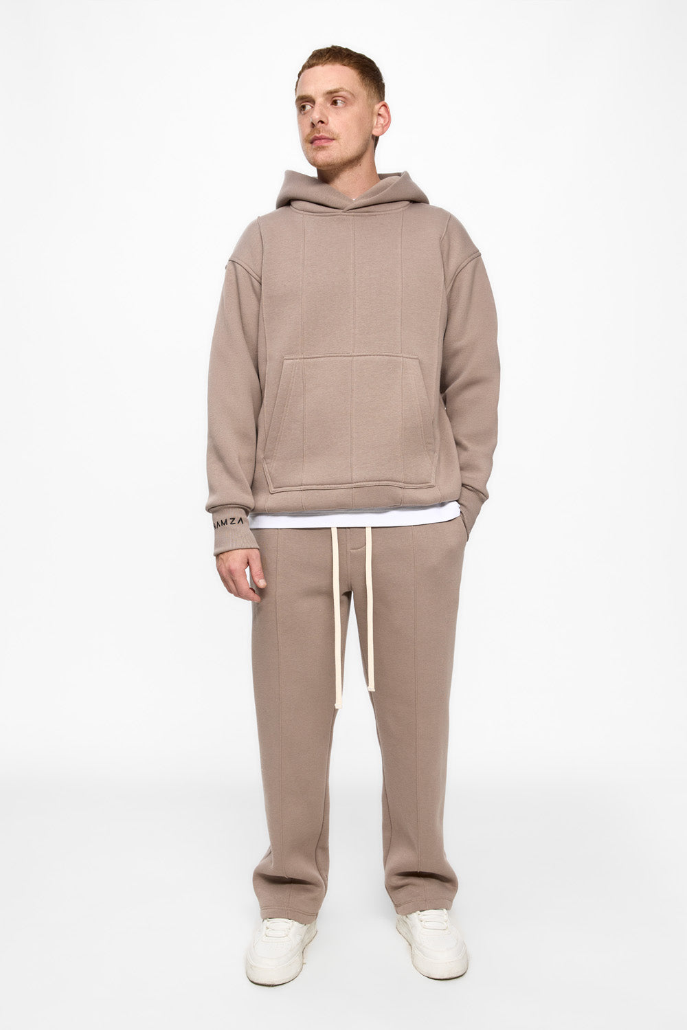 247 fleece Beige sweatpants with decorative stitching