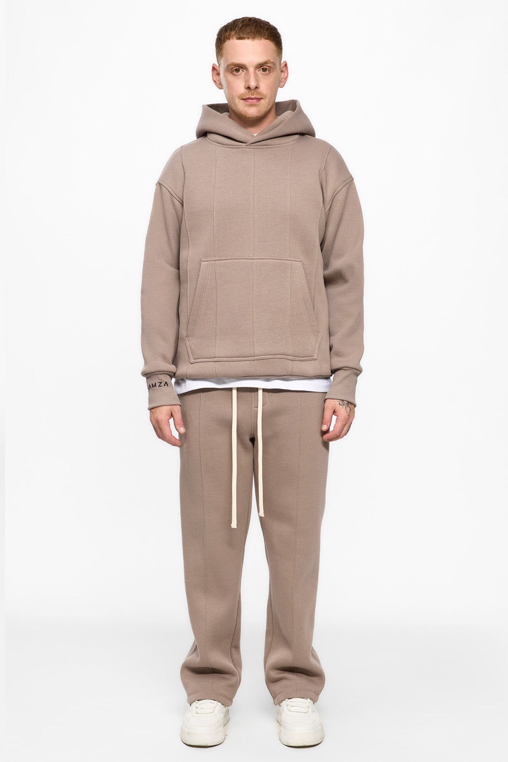 247 fleece Beige sweatpants with decorative stitching