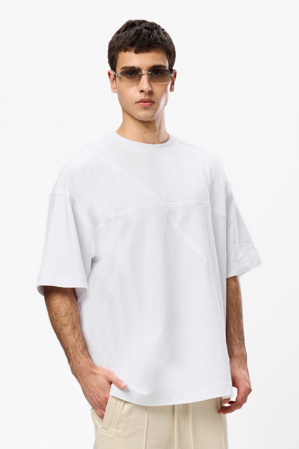 Oversized white T-shirt with decorative stitches