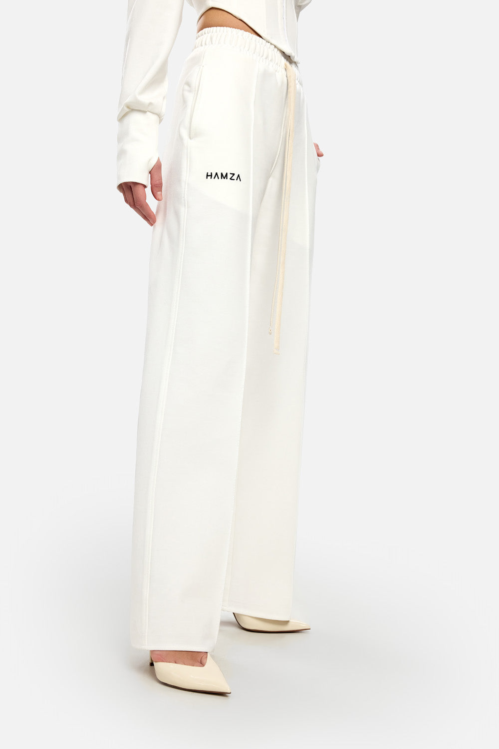 Pantaloni off white evazati cu talie inalta Karol