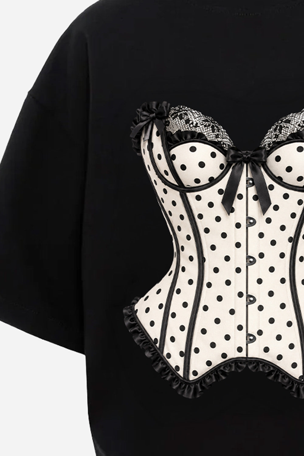 Prim-plan al imprimeului Polka Dots Corset de pe partea frontală a tricoului oversized negru pentru femei