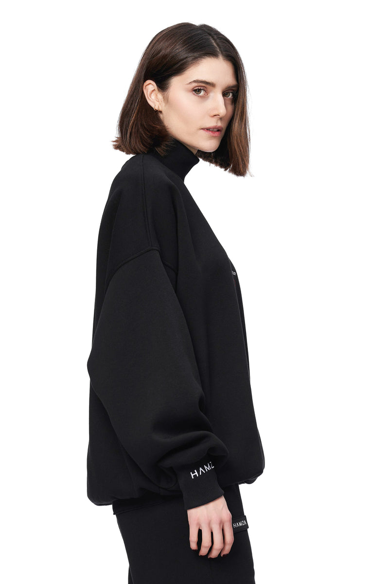 Murmur Embroidered W Turtleneck
